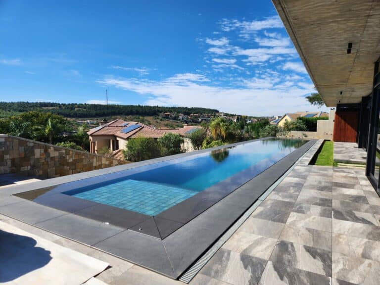 NSPI award-winning pool by Homexterior Pools in Eastern Cape — A 25-meter Swimming Pool Masterpiece In Waterkloof Ridge — photograph 1 of 20