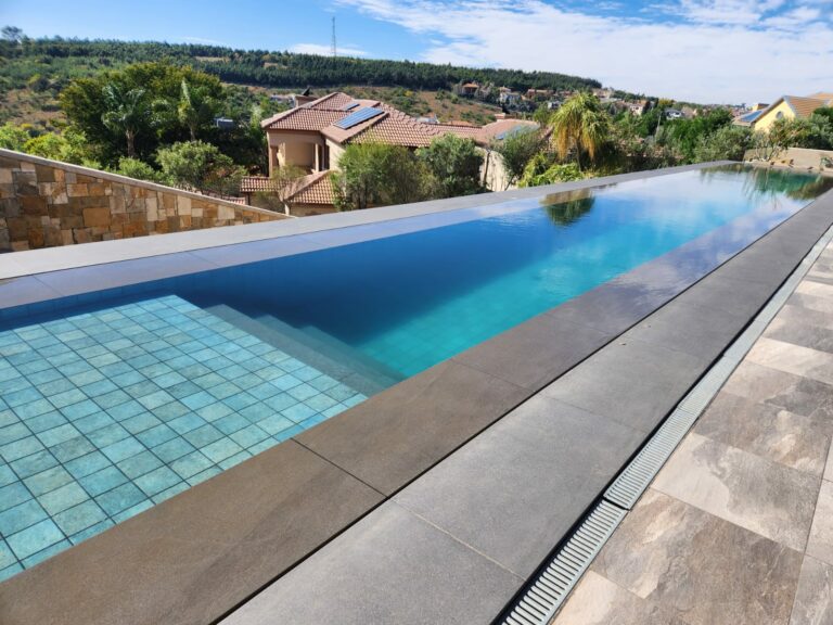 NSPI award-winning pool by Homexterior Pools in Eastern Cape — A 25-meter Swimming Pool Masterpiece In Waterkloof Ridge — photograph 2 of 20